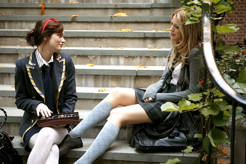 Blair Waldorf in a chic school uniform with a blazer and pleated skirt